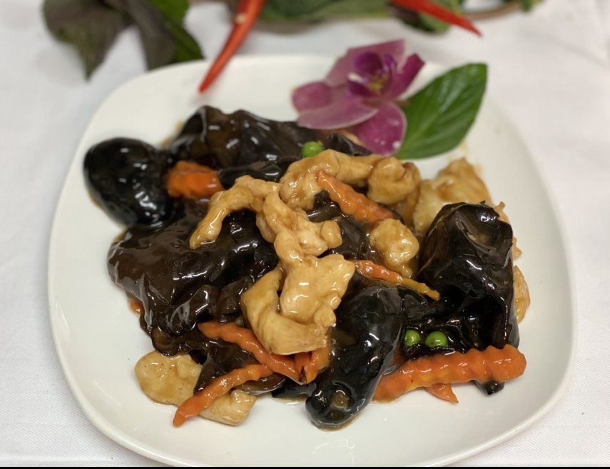 Poulet sauté aux champignons noirs
